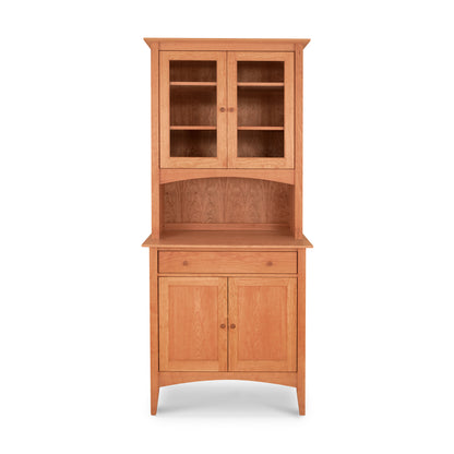 An American Shaker Small 38" China Cabinet by Maple Corner Woodworks, with a glass door, featuring hardwood construction for sturdy storage.