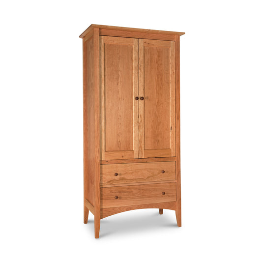 A premium-quality craftsmanship, Maple Corner Woodworks American Shaker Armoire with two doors on top and a drawer at the bottom, standing against a white background.