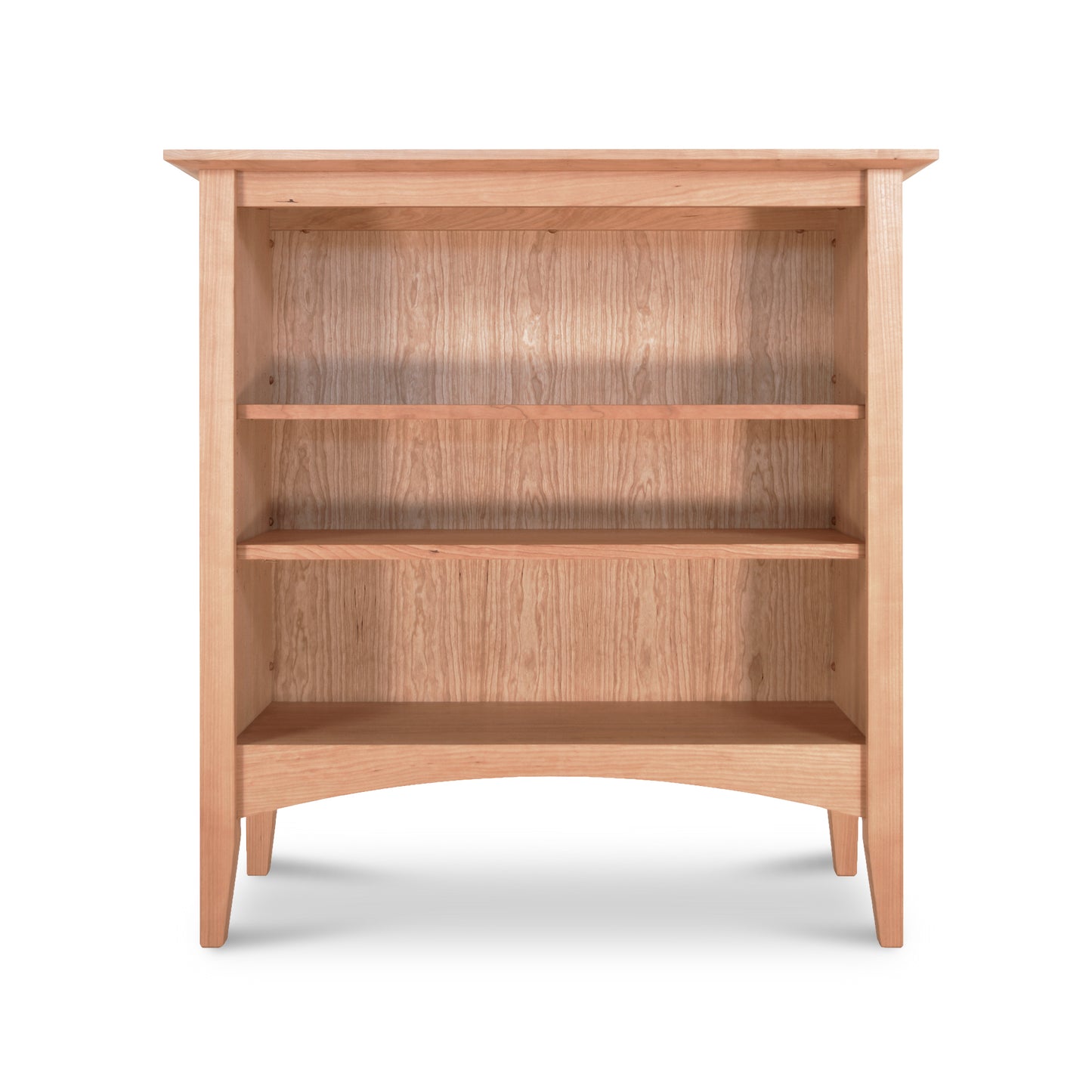 A Maple Corner Woodworks American Shaker bookcase, made from sustainably harvested hardwoods, set on a white background.