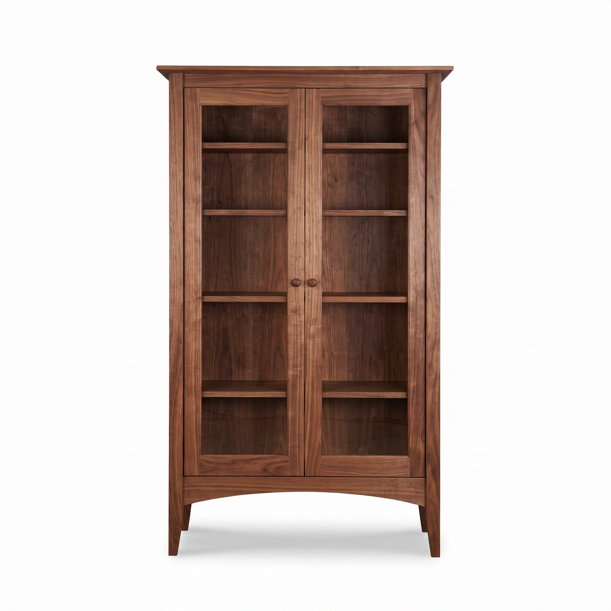 American Shaker Bookcase by Maple Corner Woodworks with glass double doors, three shelves, and round handles showcases fine American craftsmanship.