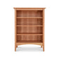 A Maple Corner Woodworks American Shaker bookcase made of sustainably harvested hardwoods, showcased on a white background.