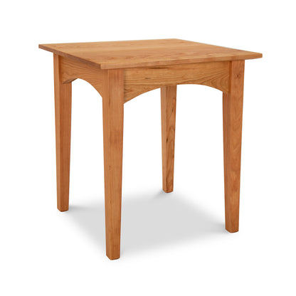 A small American Shaker End Table with a square top, crafted from solid natural cherry wood by Maple Corner Woodworks.