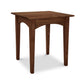 A solid wood Maple Corner Woodworks American Shaker end table with four legs, isolated on a white background.
