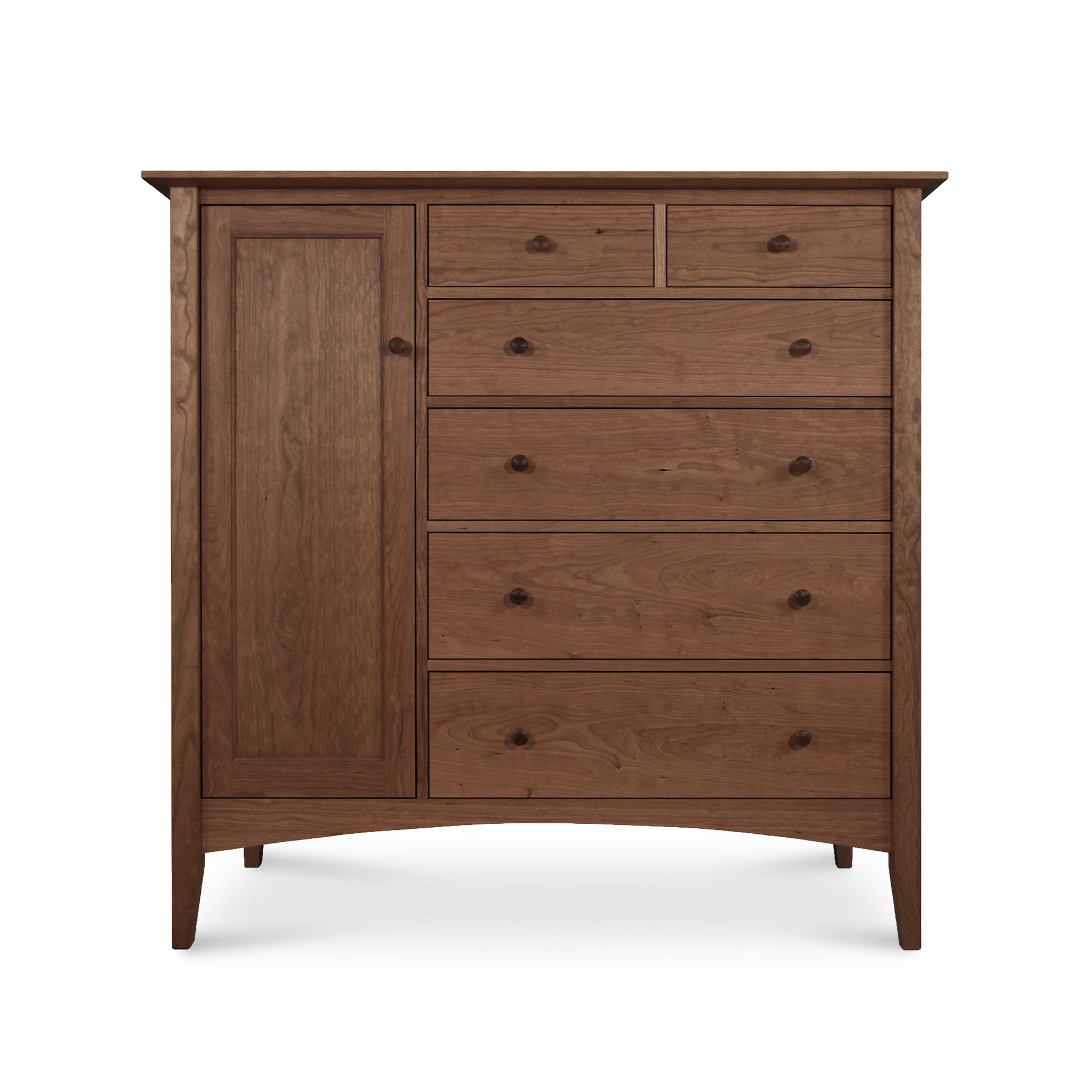 This upscale bedroom dresser showcases Maple Corner Woodworks craftsmanship with its wooden construction, featuring multiple drawers and a door for added functionality. The product is the American Shaker Gent's Chest.
