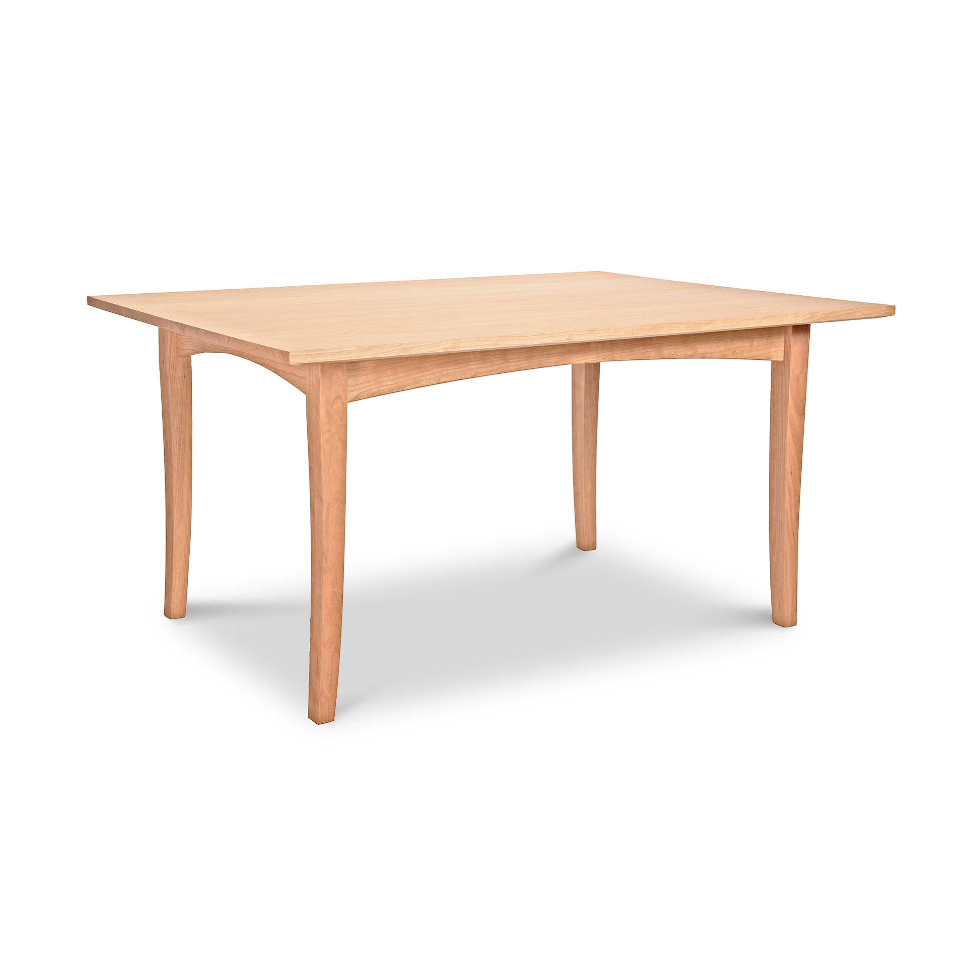 A Maple Corner Woodworks American Shaker Rectangular Solid Top Table, made of natural American hardwood, showcased on a white background.