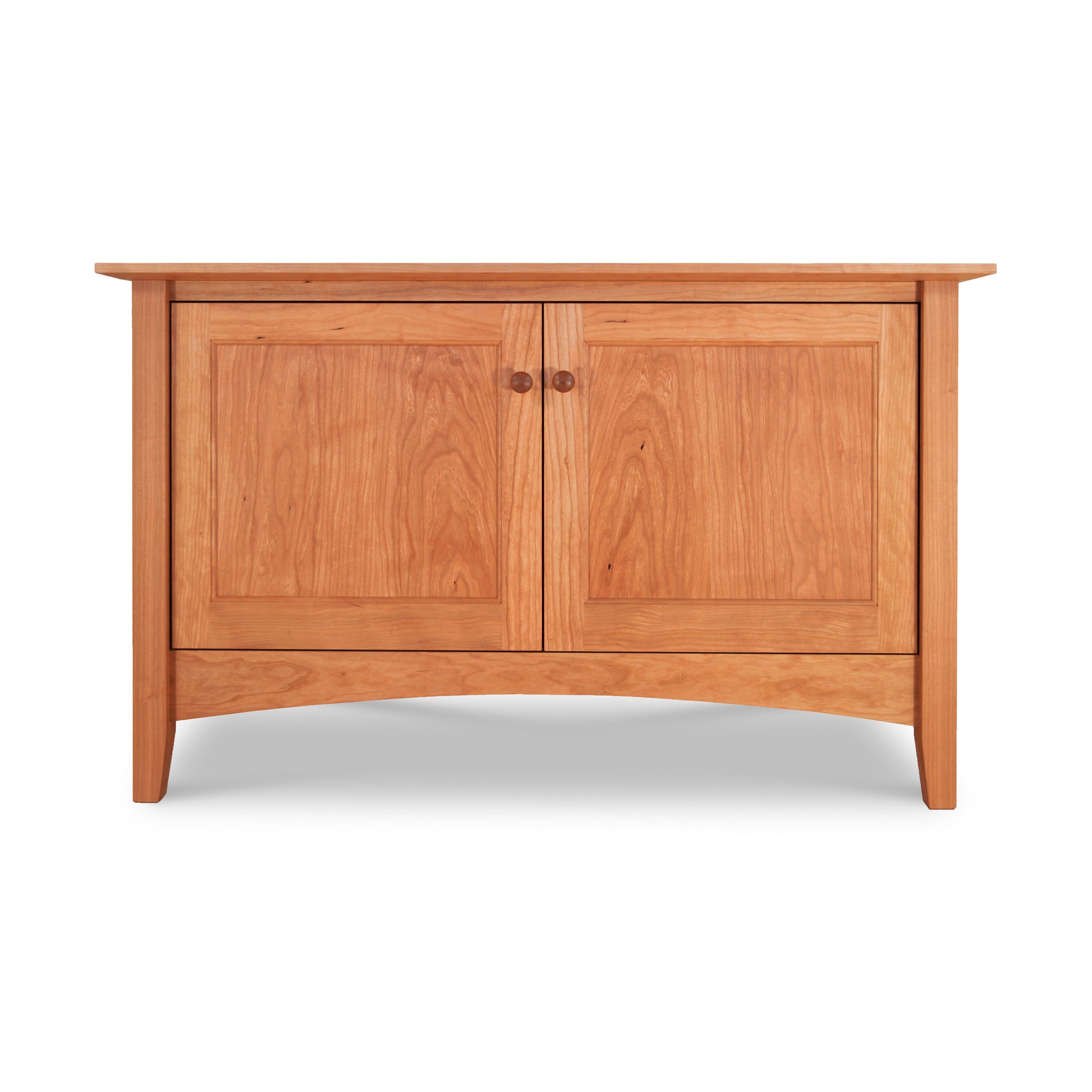 A small Maple Corner Woodworks American Shaker 48" TV Stand crafted with Vermont craftsmanship using solid hardwoods. This wooden cabinet features two doors and two drawers, combining both style and functionality.