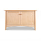 American Shaker 48″ TV Stand by Maple Corner Woodworks, light wood, flat top, two doors with round knobs, classic handcrafted design.
