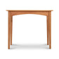 An Maple Corner Woodworks American Shaker sofa table in natural cherry against a white background.
