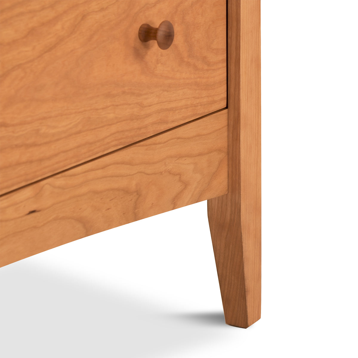 American Shaker 7-Drawer Dresser by Maple Corner Woodworks, with round knobs and tapered solid wood legs, quality American made furniture.