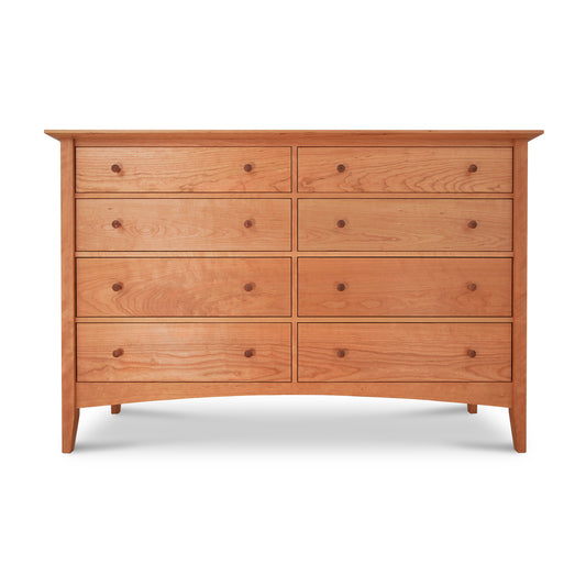 Alt text: American Shaker 8-Drawer Dresser by Maple Corner Woodworks made from light oak, showcasing Vermont craftsmanship. This solid wood dresser features a simple rectangular design, round wooden knobs, smooth surface with visible wood grain, and four short legs. Perfect example of high quality American made furniture.