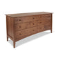 American Shaker 6-Drawer Dresser by Maple Corner Woodworks in classic Vermont style with round knobs and tapered legs, crafted from quality hardwood.
