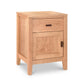 A Andover Modern 1-Drawer Nightstand with Door crafted by Maple Corner Woodworks, featuring a simple design with one drawer and a cabinet, isolated on a white background.