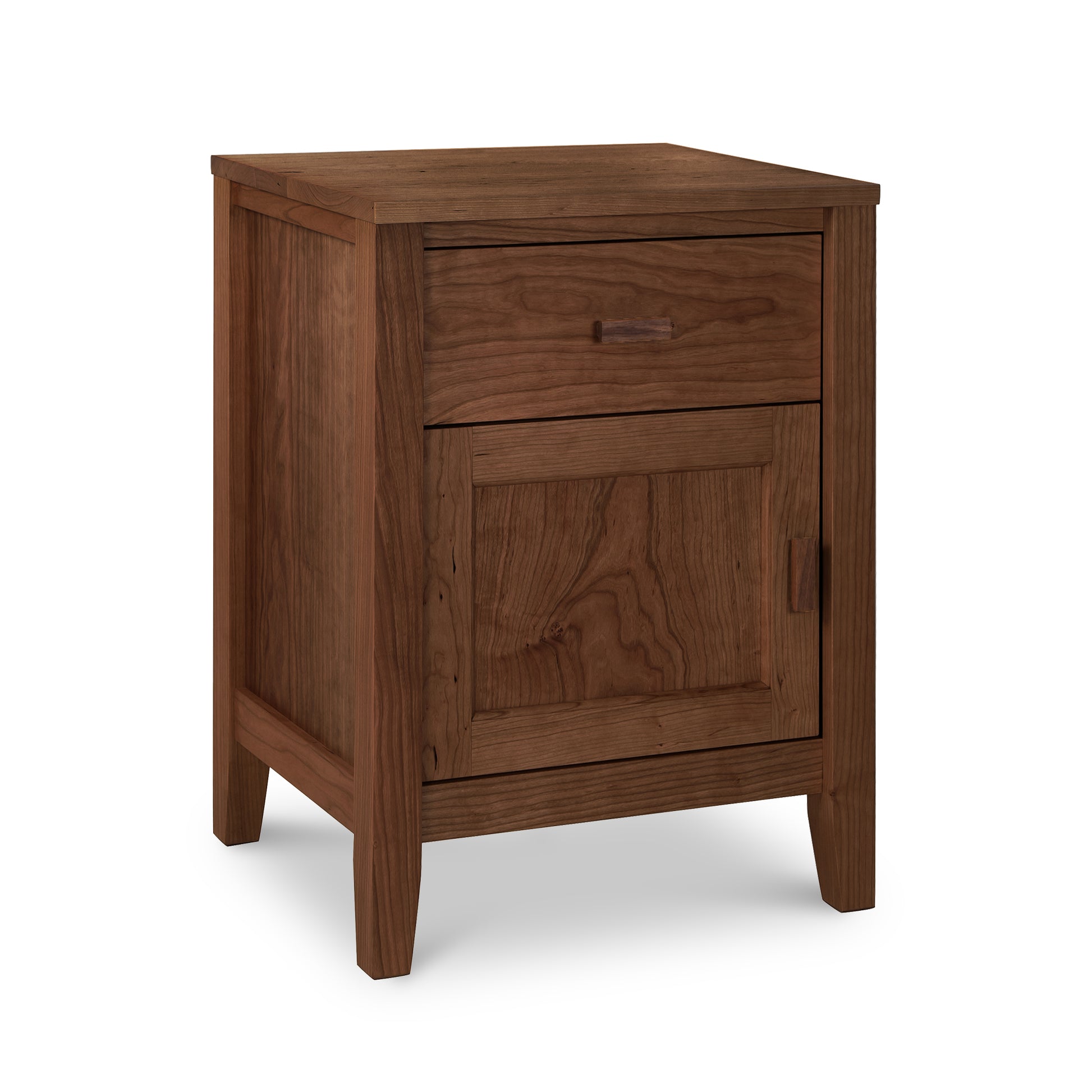 An Maple Corner Woodworks Andover Modern 1-Drawer Nightstand with Door crafted by Vermont woodworkers from sustainable hardwoods, featuring a smooth finish with a single drawer and a cabinet door, set against a plain white background.
