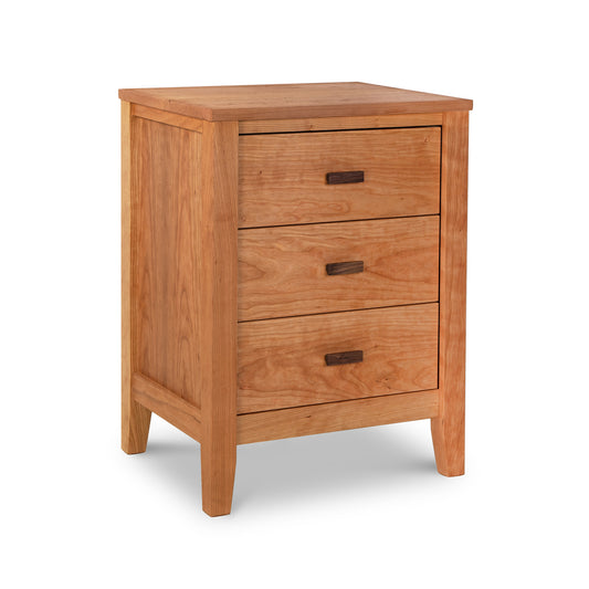 A Maple Corner Woodworks Andover Modern 3-Drawer Nightstand, crafted from eco-friendly materials and showcasing Vermont craftsmanship, is isolated on a white background.