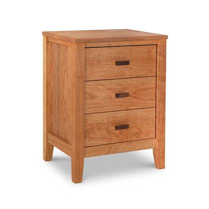 A Maple Corner Woodworks Andover Modern 3-Drawer Nightstand, featuring a simple design with flat surfaces and sharp corners. The drawers have horizontal handles. The table is photographed against a white background and represents eco-friendly furniture.