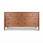 Andover Modern 7-Drawer Dresser by Maple Corner Woodworks, crafted from solid wood with dark handles, showcases American made quality.
