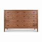 Maple Corner Woodworks Andover Modern 8-drawer dresser with simple handles, tapered legs, and solid wood construction.