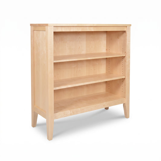 Andover Modern Bookcase by Maple Corner Woodworks, crafted from solid wood with three shelves, four legs, and clean lines in a minimalist style.