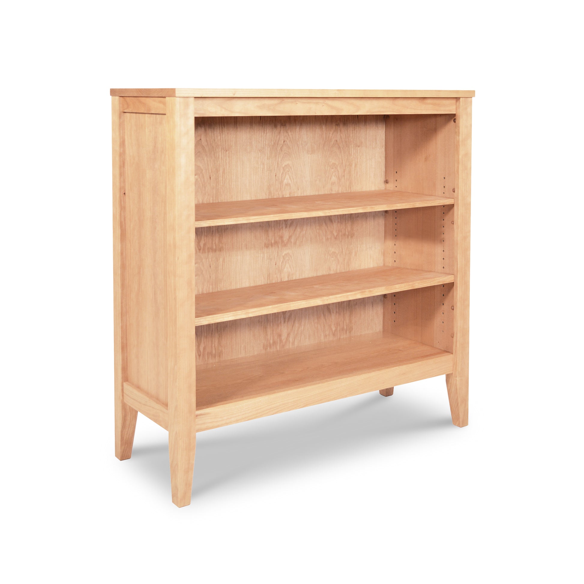 Andover Modern Bookcase by Maple Corner Woodworks featuring three shelves and a light wood finish, crafted from sustainably sourced materials.