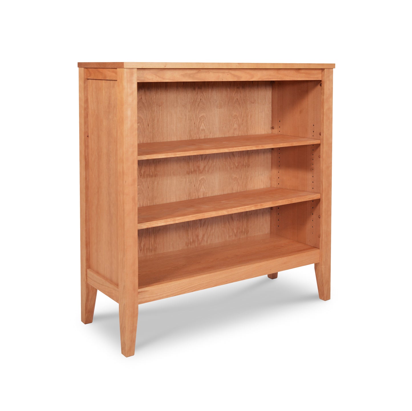 Andover Modern Bookcase with three shelves, light brown finish, four-leg design, crafted sustainably by Maple Corner Woodworks.