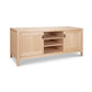 Andover Modern 64″ TV Stand by Maple Corner Woodworks features 2 cabinets, 3 open shelves, and a rectangular top on low legs.