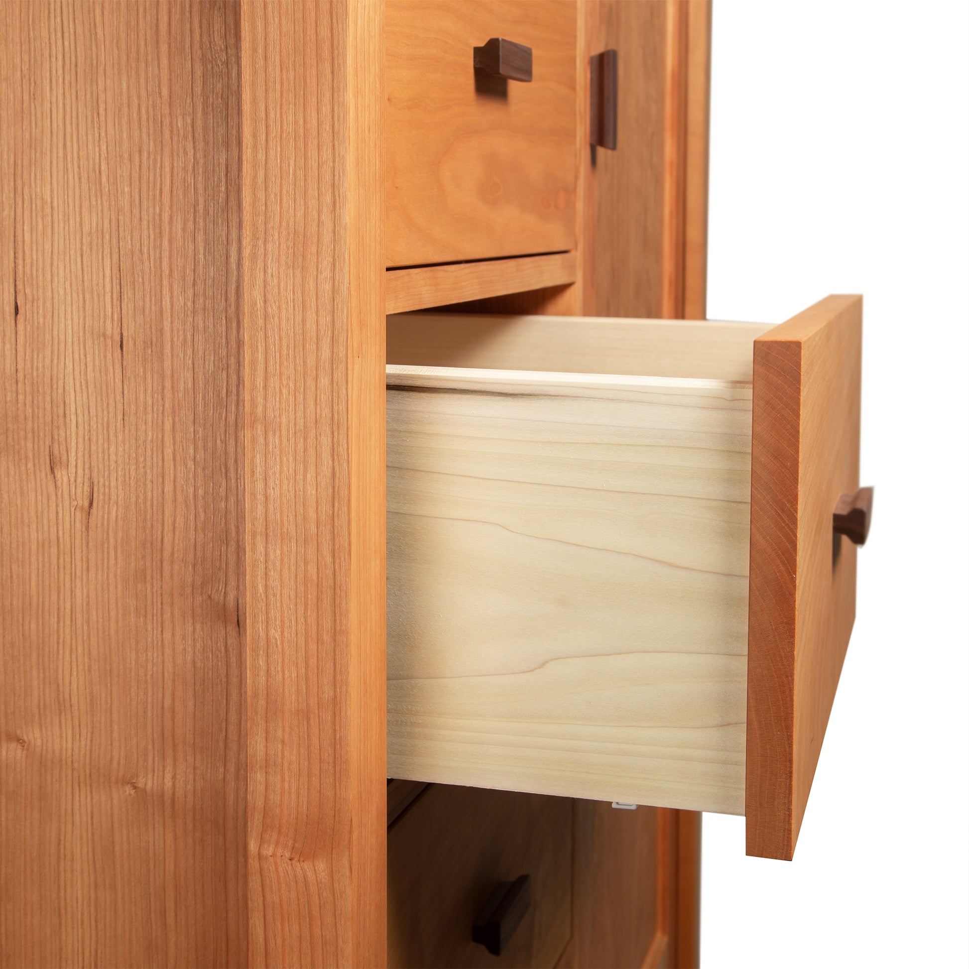 Andover Modern Sweater Chest by Maple Corner Woodworks with one open drawer, highlighting fine Vermont craftsmanship and elegant wood design.