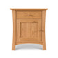 Andrews 1-Drawer Nightstand by Lyndon Furniture in light wood, with a drawer, door cabinet, and round knobs on four sturdy legs.