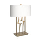 Antasia #1 Table Lamp by Hubbardton Forge with a handcrafted sculptural gold base and white shade, showcasing elegant American-made furniture design.