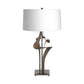 Antasia #2 Table Lamp by Hubbardton Forge with a hand-sculpted bronze base and white drum shade, showcasing elegant American craftsmanship.