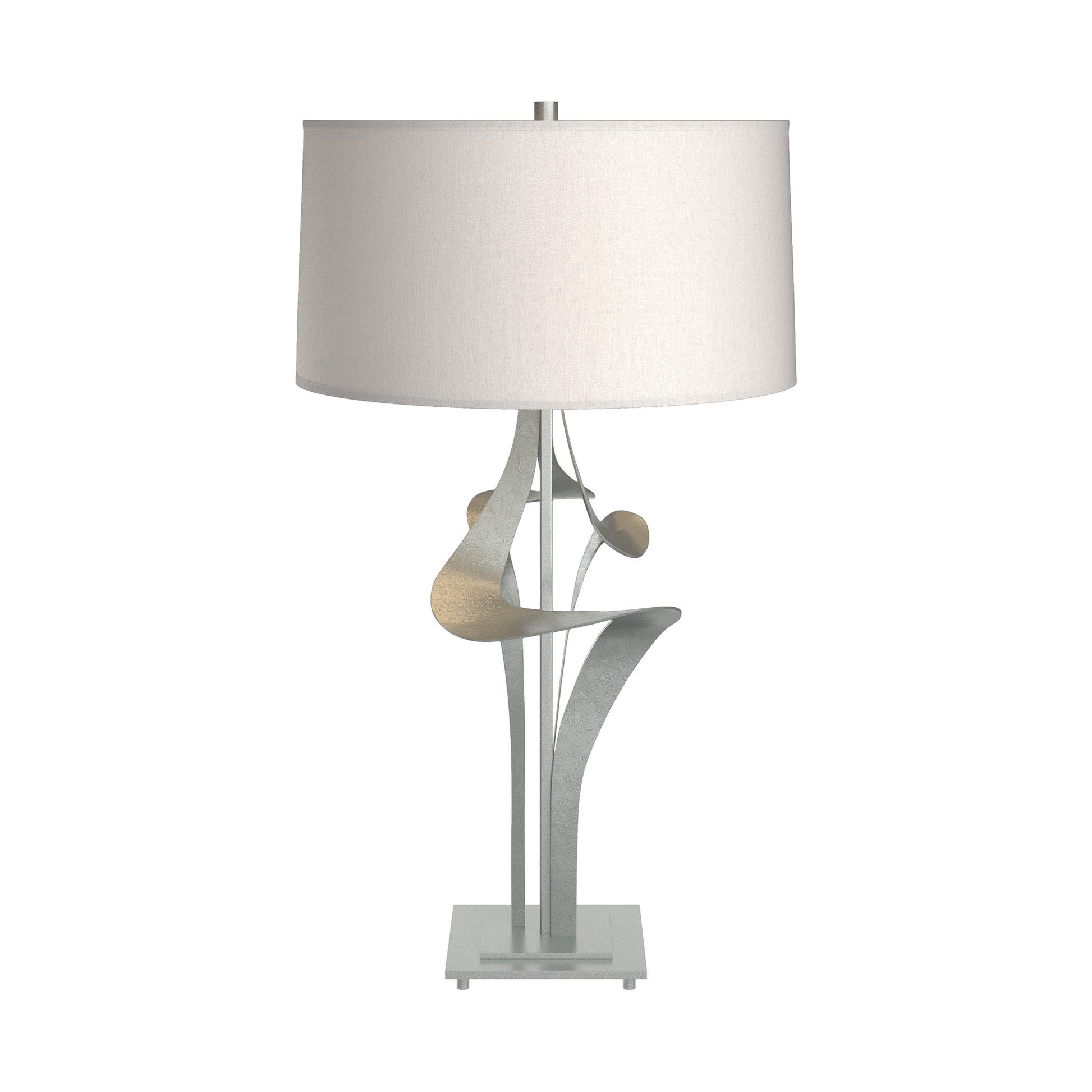 Antasia #2 Table Lamp by Hubbardton Forge with sculptural metallic base and white drum shade, showcasing elegant craftsmanship and modern design.