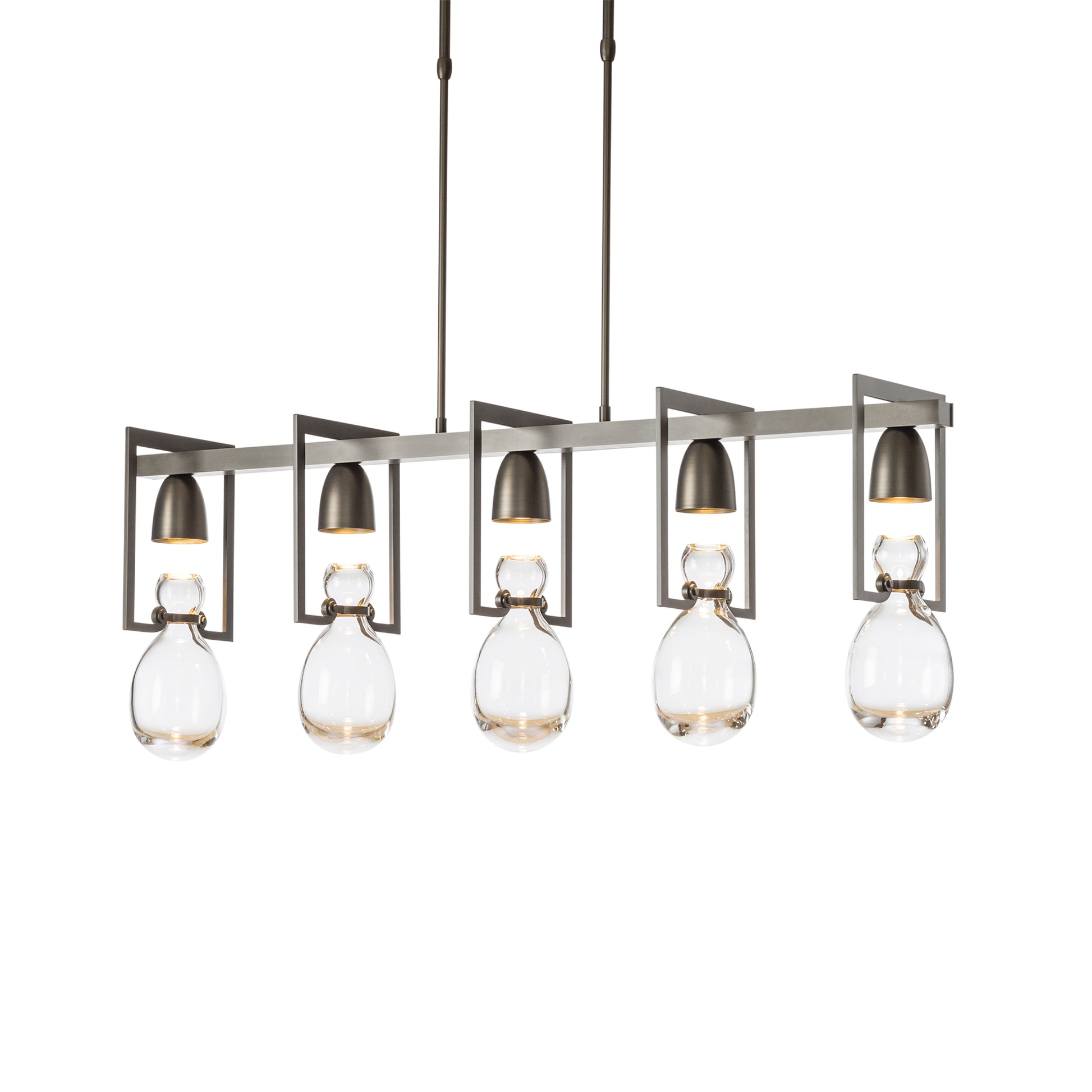 A handcrafted modern Apothecary Pendant with glass balls hanging from it by Hubbardton Forge.