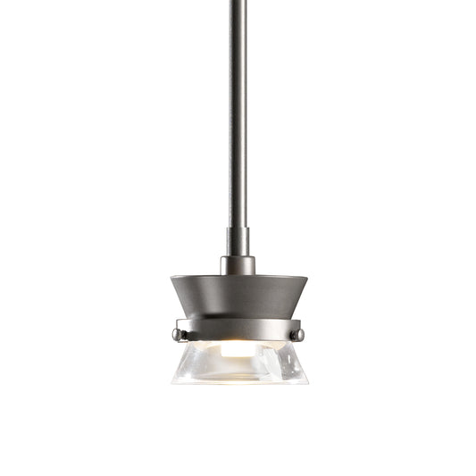 The Hubbardton Forge Apparatus Mini Pendant is a modern pendant light with a glass shade that perfectly captures the essence of industrial lighting.
