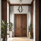 Double wooden entryway doors crafted from solid wood, showcasing expert American craftsmanship and elegant design by Vermont Woods Studios.