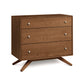 The Copeland Furniture Astrid 3-Drawer Chest of Drawers is a modern piece made with sustainable hardwood legs.