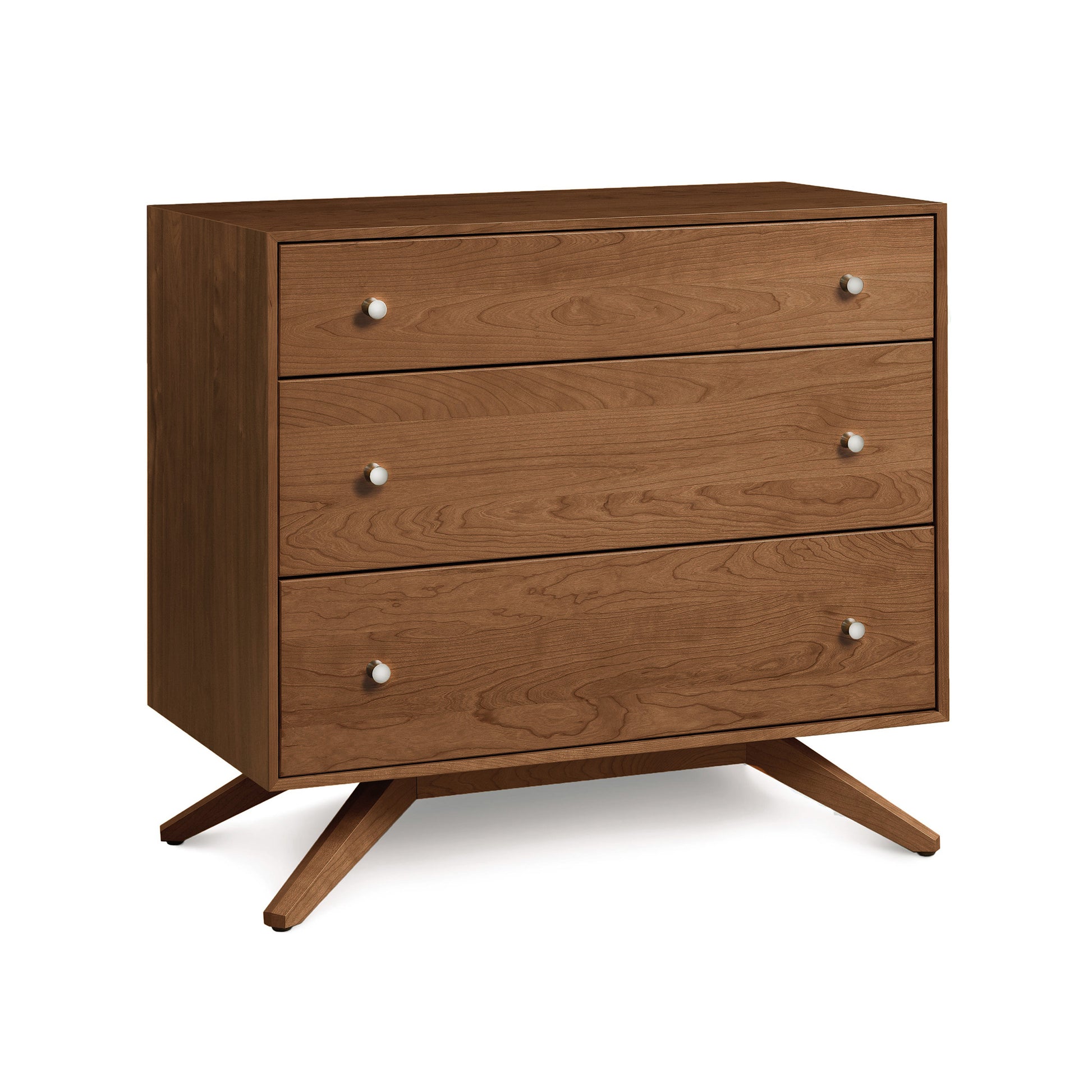 A wooden Copeland Furniture Astrid 3-Drawer Chest with angled legs, isolated on a white background.