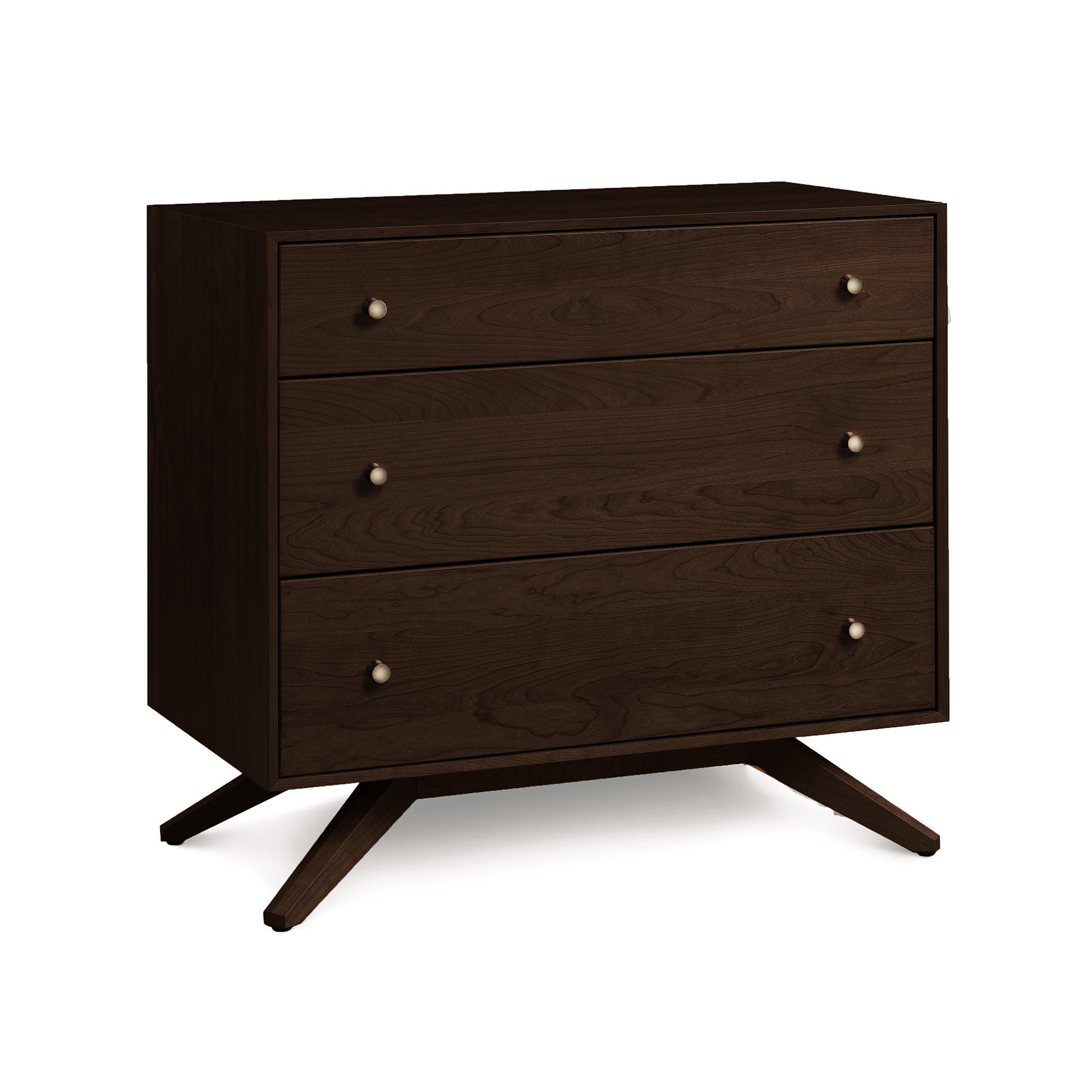 The sustainable hardwood Copeland Furniture Astrid 3-Drawer Chest is featured in a dark brown color, contrasting with the white background.