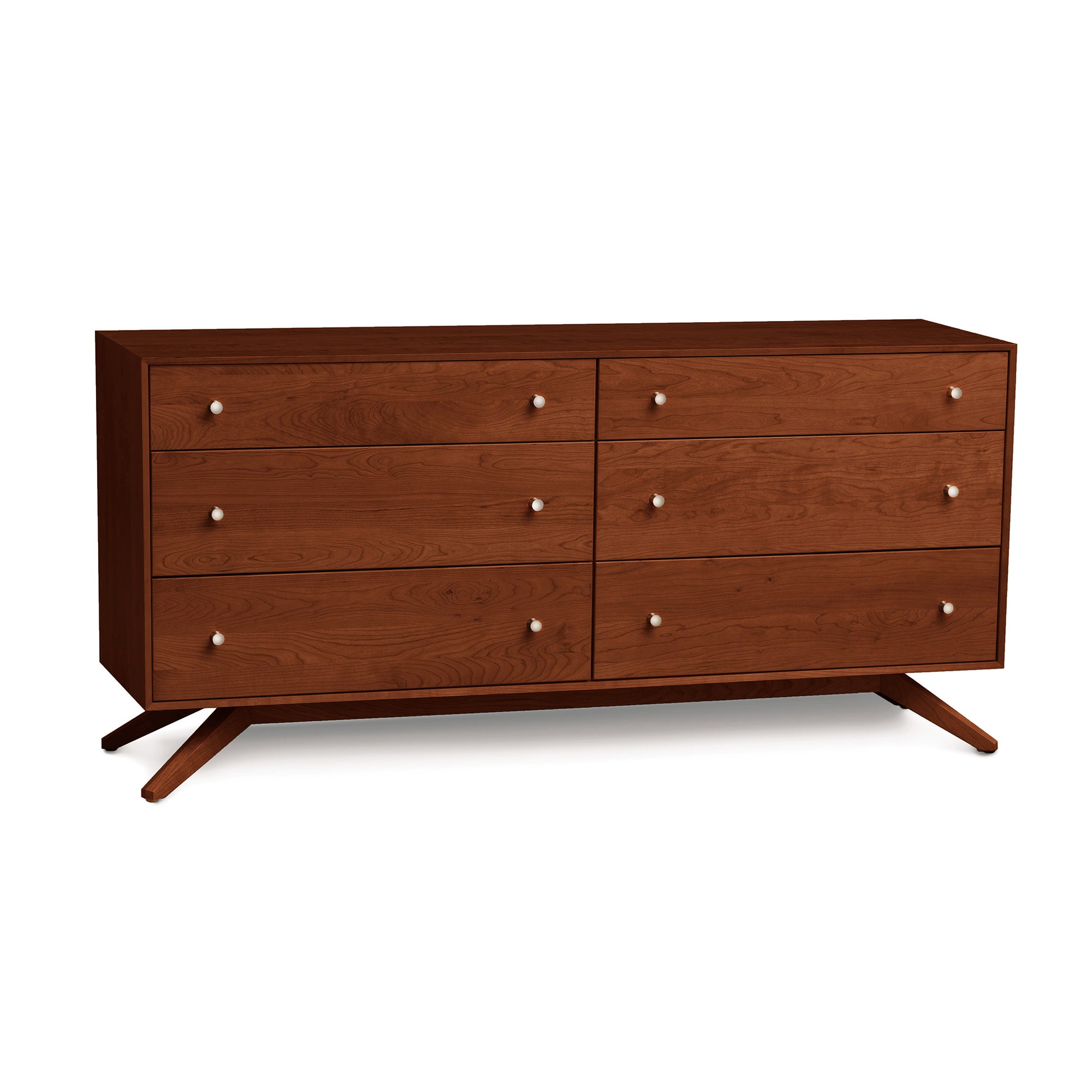 A cherry wooden Astrid 6-Drawer Dresser with angled legs on a white background by Copeland Furniture.
