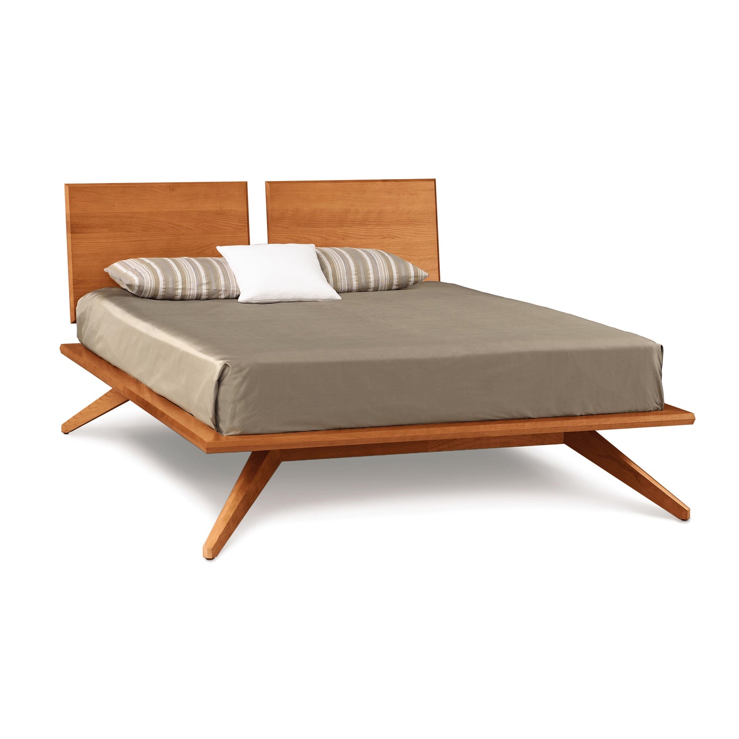 Copeland Furniture Astrid Platform Bed with eco-friendly hardwood and mid-century modern angled legs, featuring a beige mattress and two striped pillows.