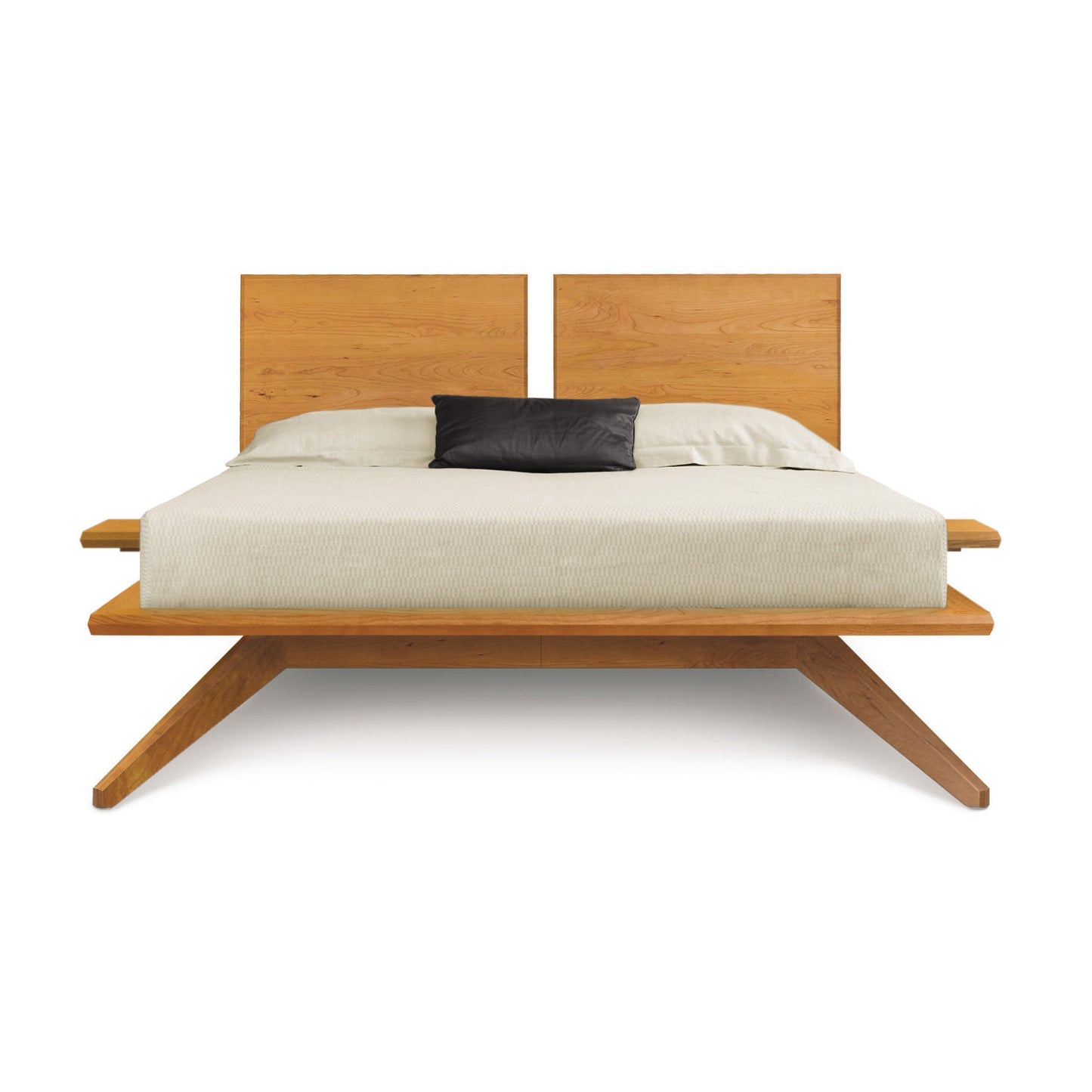A modern Astrid Cherry Platform Bed frame from Copeland Furniture with a light-colored mattress and a set of pillows, isolated on a white background.