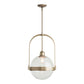 The Hubbardton Forge Atlas Mini Pendant is a handcrafted in Vermont brass pendant light featuring a clear glass globe.