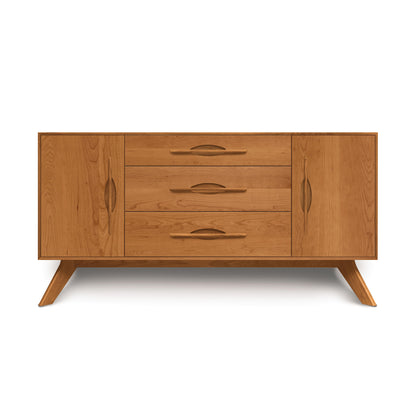 A modern wooden Copeland Furniture Audrey 2-Door 3-Drawer Buffet with angled legs.