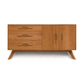 Mid-century modern style Audrey 2-Door 3-Drawer Buffet with tapered legs, featuring three drawers on the left and a two-door cabinet on the right, isolated against a white background. (Brand: Copeland Furniture)