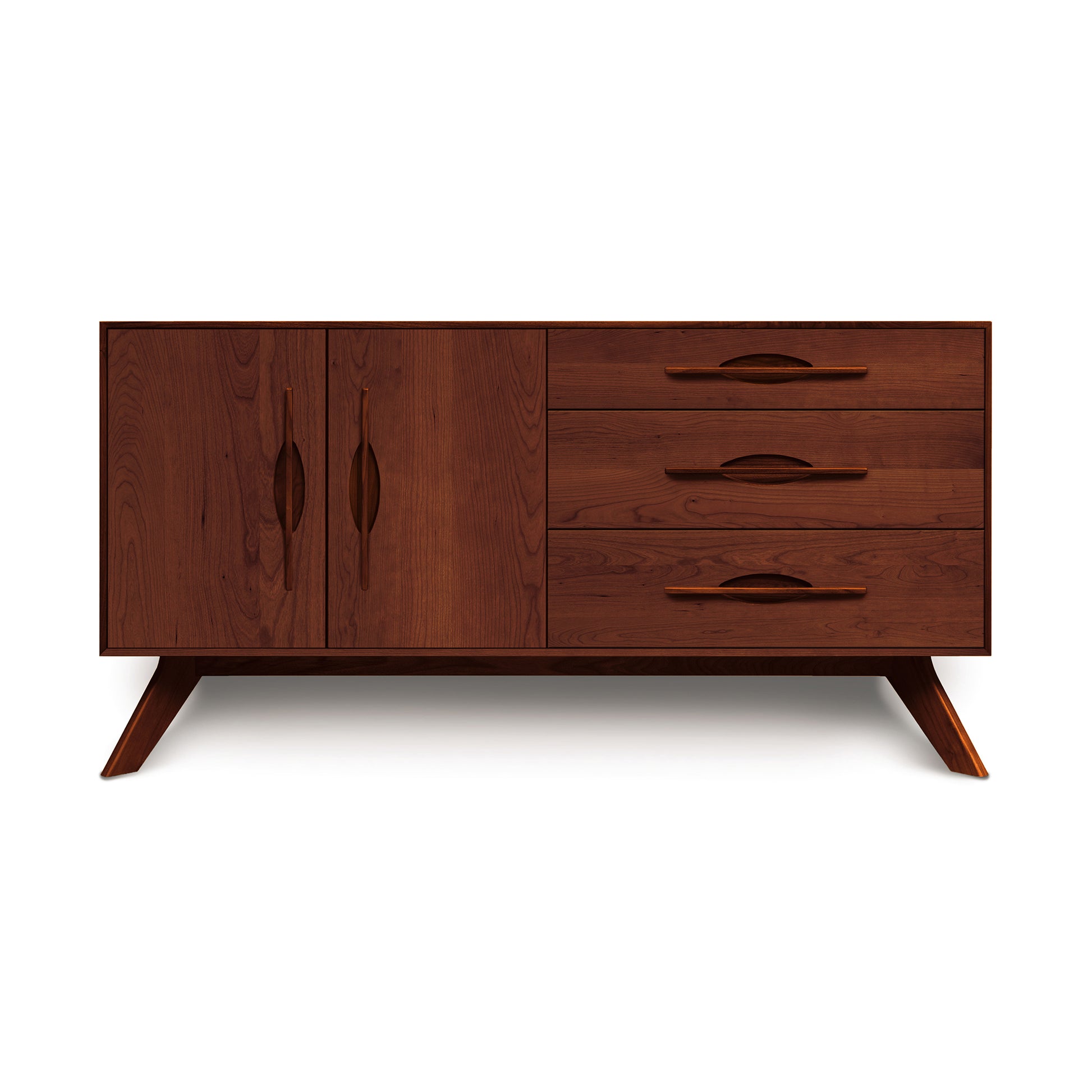 A mid-century modern style wooden sideboard with tapered legs, featuring two doors and three drawers with integrated handle cutouts, isolated on a white background. - The Audrey 2-Door 3-Drawer Buffet by Copeland Furniture