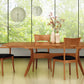 Audrey Extension Dining Table by Copeland Furniture, handcrafted in Vermont from solid wood, shown with matching chairs.