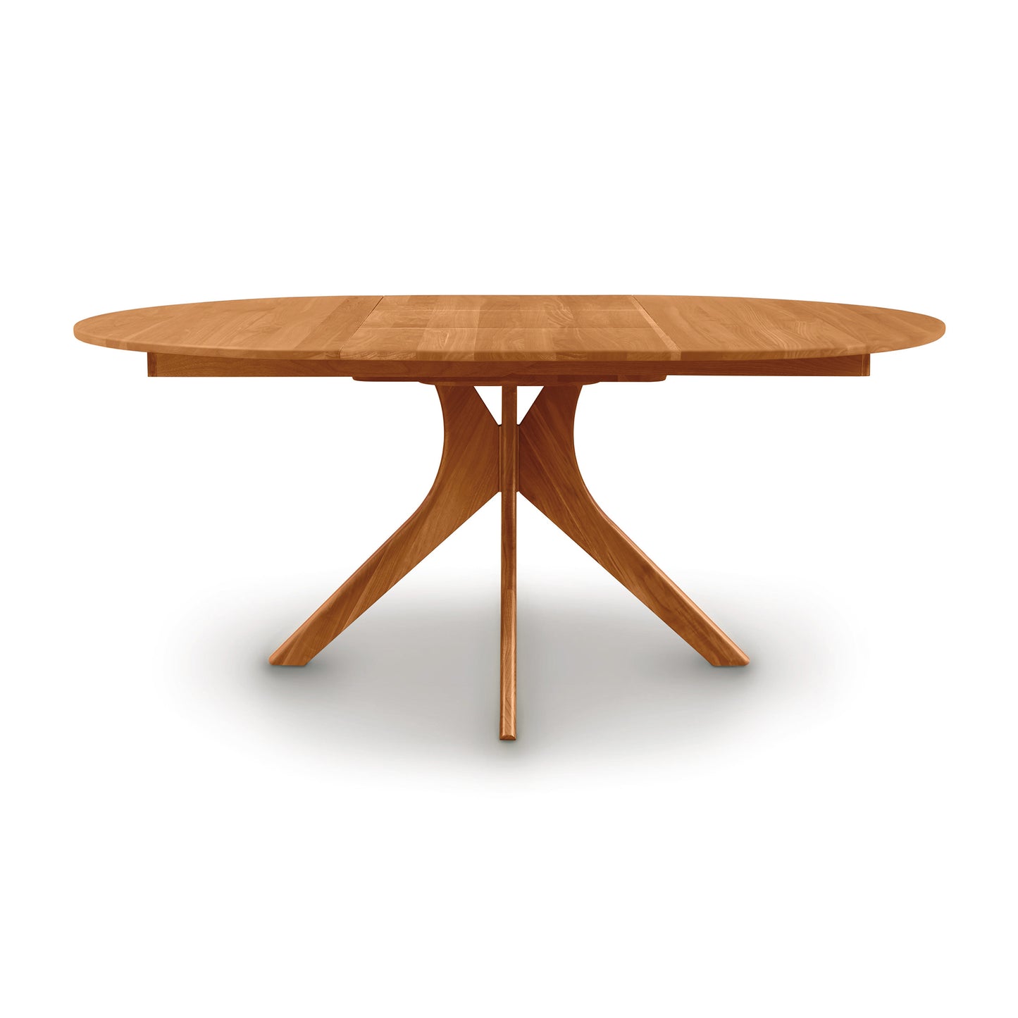 A solid wood Audrey Round Extension Dining Table with a pedestal base and extension, isolated on a white background by Copeland Furniture.