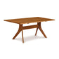 An Audrey Solid Top Dining Table by Copeland Furniture with a wooden top.