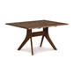 Audrey Solid Top Dining Table by Copeland Furniture with distinctive geometric base, showcasing modern craftsmanship and elegant design.