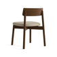 Baton Chair by Copeland Furniture with curved wood backrest and light beige cushioned seat, viewed from the back. American made.