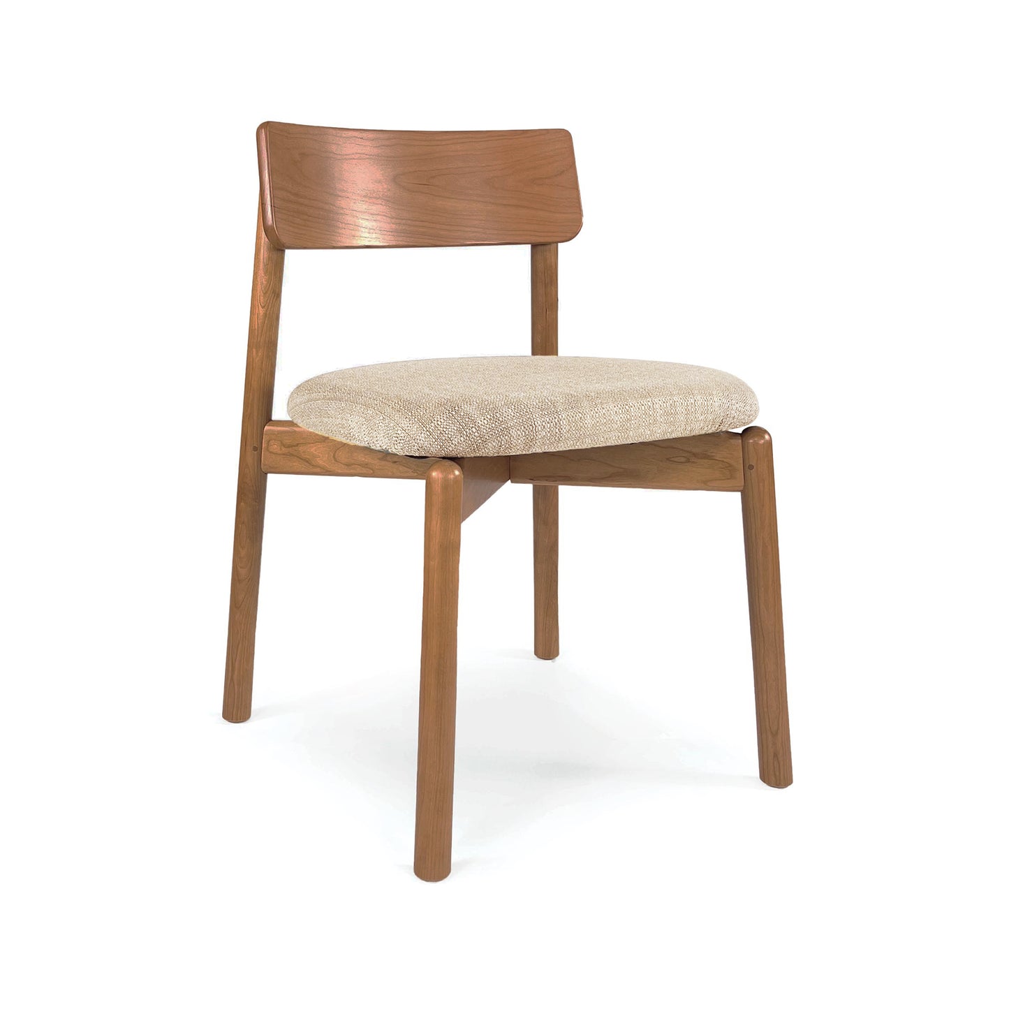 Baton Chair by Copeland Furniture with a curved backrest and beige upholstered seat, showcasing quality American craftsmanship.