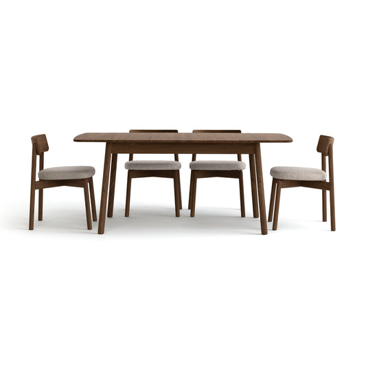Copeland Baton Extension Dining Table with four matching chairs, expertly crafted American made hardwood furniture by Vermont Woods Studios.